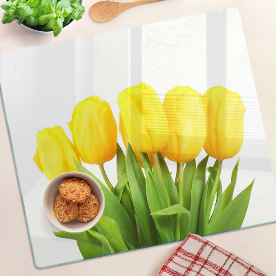 Steklena podloga za rezanje Rumeni tulipani na zelenem ozadju