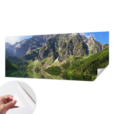 Fototapeta za otroško sobo s sličicami gora v nežnih barvah