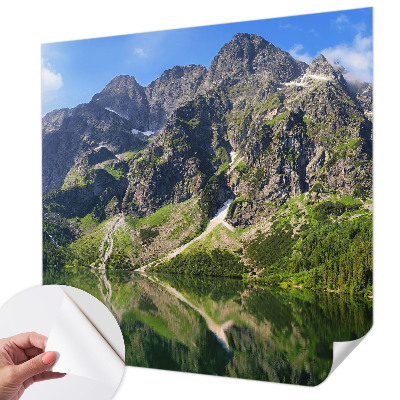 Fototapeta za otroško sobo s sličicami gora v nežnih barvah