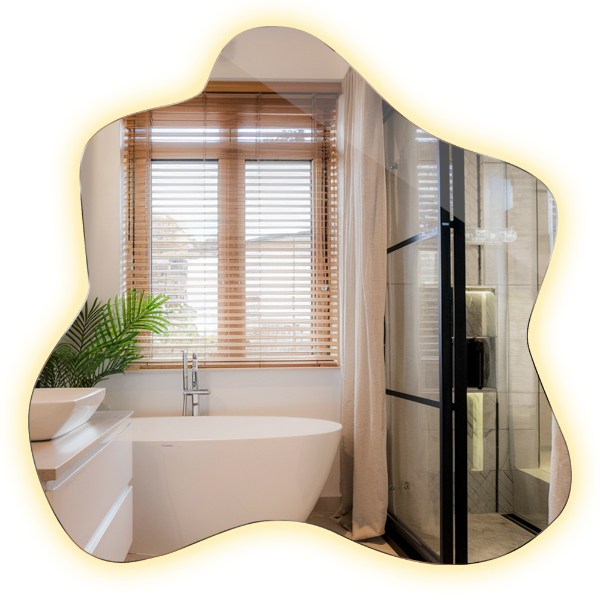 Ogledalo v obliki packe LED osvetljeno