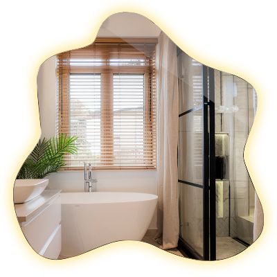 Ogledalo v obliki packe LED osvetljeno