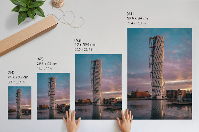 Eleganten plakat za dnevno sobo Sodoben stolp v ozadju sončnega zahoda