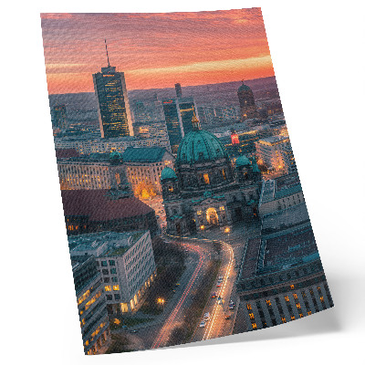Eleganten plakat za dnevno sobo Sodobno mesto zvečer s toplo osvetlitvijo