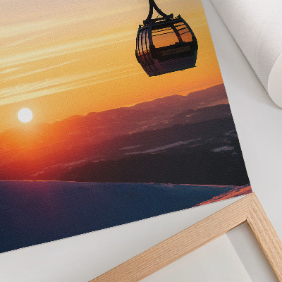 Premium stenski plakat Žičnica ob sončnem zahodu v gorah