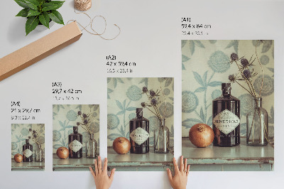 Premium stenski plakat Steklenica s cvetličnim vzorcem v ozadju