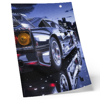 Premium stenski plakat Žarometi športnega avtomobila svetijo ponoči v mestu