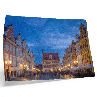 Plakat s teksturo platna Zgodovinske stanovanjske hiše zvečer z barvito svetlobo
