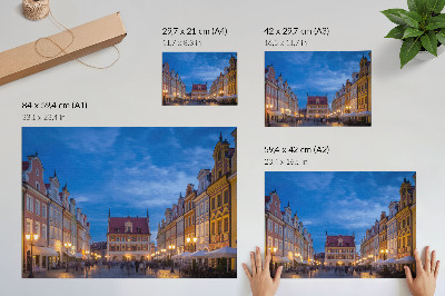 Plakat s teksturo platna Zgodovinske stanovanjske hiše zvečer z barvito svetlobo