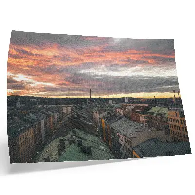 Plakat sončni zahod nad mestno panoramo v barvah