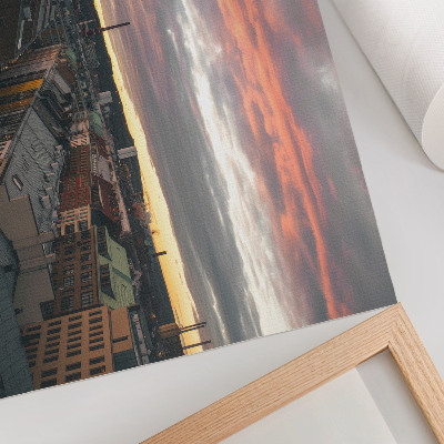 Plakat Sončni zahod nad barvami mestne panorame