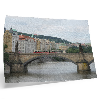 Plakat s teksturo platna Most čez reko s tramvajem, obdan s klasično arhitekturo