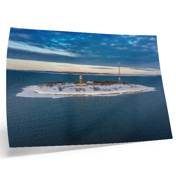 Plakat Zimski otok s svetilnikom in modrim morjem
