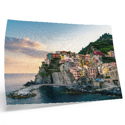 Plakat Barvite hiše na pečini nad morjem