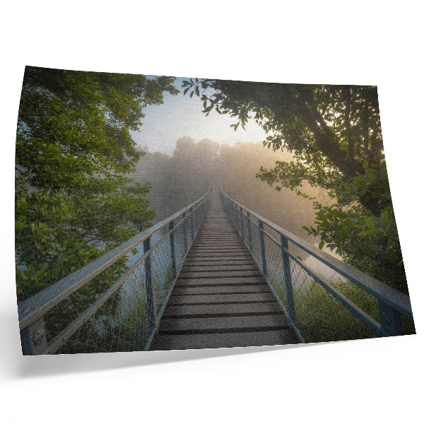 Plakat s teksturo platna Most v megli čez reko v zelenem okolju