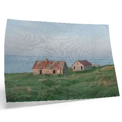 Plakat s teksturo platna rustikalne stavbe z zelenimi travniki in morjem