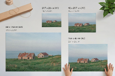Plakat s teksturo platna Rustikalne stavbe zeleni travniki morje