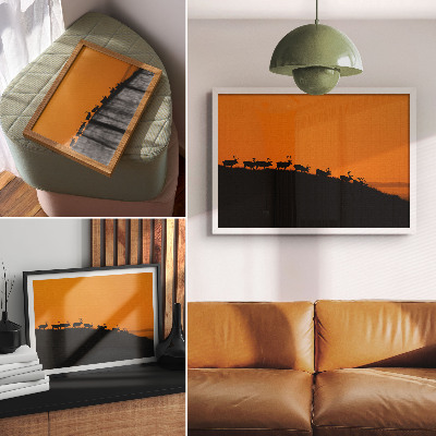 Plakat Silhuete jelenov na hribu z oranžnim ozadjem