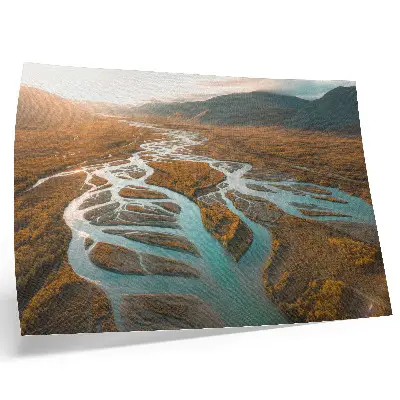 Plakat na platnu veličastna reka med zlatimi griči s turkizno vodo