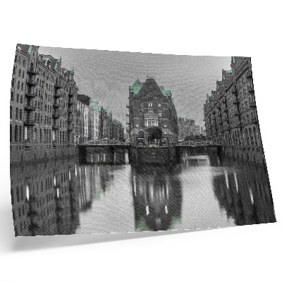 Plakat s teksturo platna Kanal z industrijskimi stavbami, odsevi v vodi