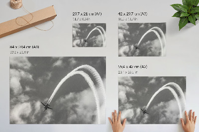 Plakat Letalo na nebu z dinamičnimi oblačnimi progami