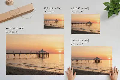 Plakat na platnu očarljiv razgled na sončni zahod nad vodo