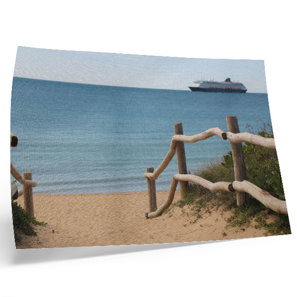 Plakat na platnu Plaža ladja morje lesene ograje pesek