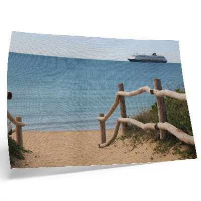 Plakat na platnu Plaža ladja morje lesene ograje pesek
