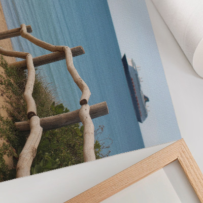 Plakat na platnu Plaža ladja morje lesene ograje pesek