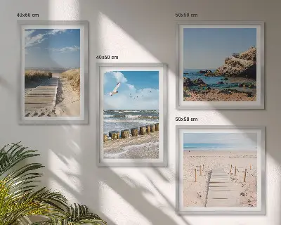 Komplet štirih slik v okvirju motiv plaže s peskom, valovi, nebom in pticami