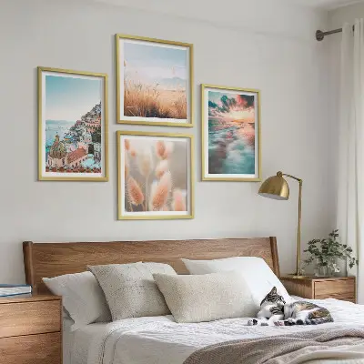 Komplet štirih slik v okvirju hiše ob sončnem zahodu na morju s cvetjem