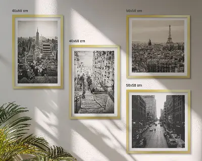 Pripravljena stenska galerija z motivi razgledov Pariza in New Yorka za stopnice