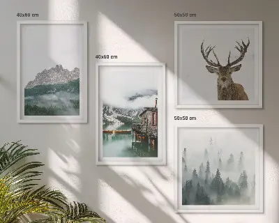 Komplet štirih slik v okvirju z motivom gora, jezera, jelenov, koče in megle